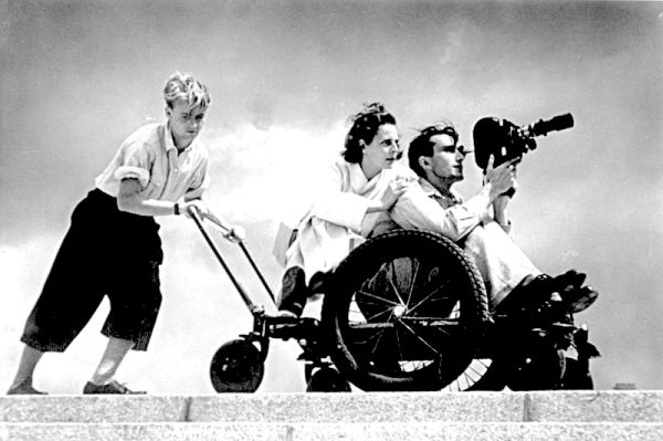 Leni Riefenstahl, center, filming with two assistants, 1936. (Bundesarchiv, CC-BY-SA 3.0, Wikimedia Commons)